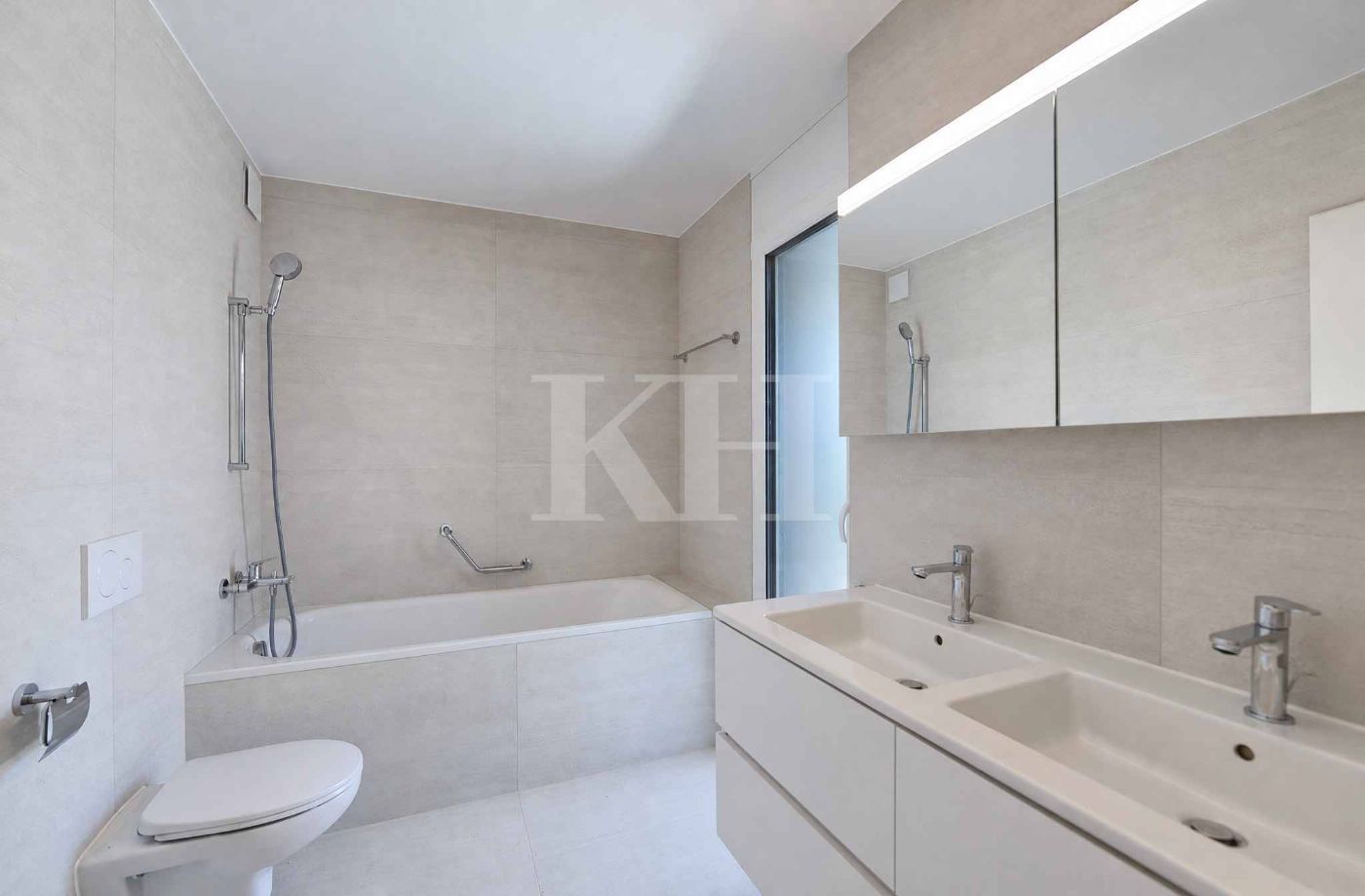 Appartement de 5,5 pièces neuf avec magnifiques finitions en rez de jardin !