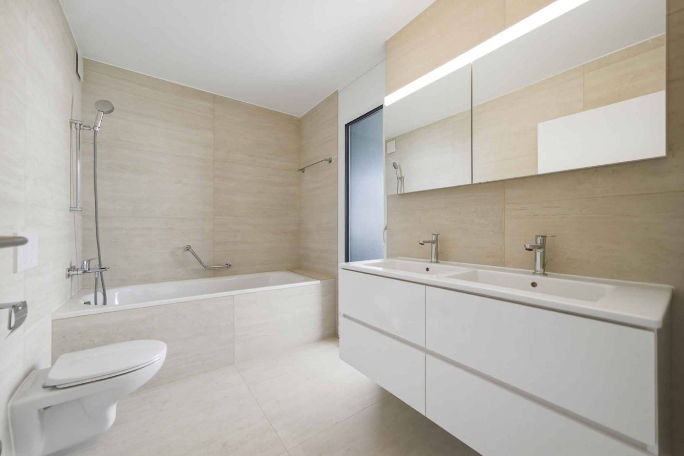 Appartement neuf de standing – 5.5 pièces en angle avec terrasse et jardin privatif